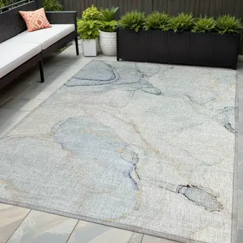 5' X 8' Beige and Blue Abstract Washable Non Skid Indoor Outdoor Area Rug