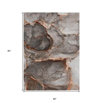 5' X 8' Peach Abstract Washable Non Skid Indoor Outdoor Area Rug