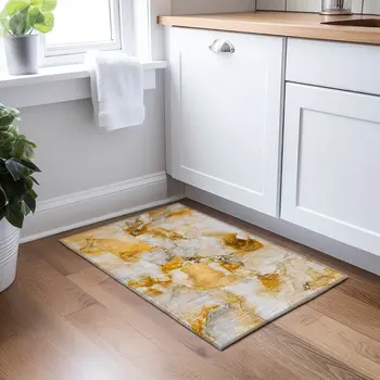 2' X 3' Orange and Ivory Abstract Washable Indoor Outdoor Area Rug