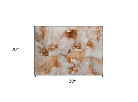 2' X 3' Orange and Ivory Abstract Washable Indoor Outdoor Area Rug