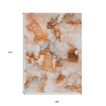 9' X 12' Orange and Ivory Abstract Washable Non Skid Indoor Outdoor Area Rug