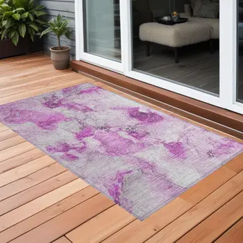 2' X 3' Pink and Ivory Abstract Washable Non Skid Indoor Outdoor Area Rug