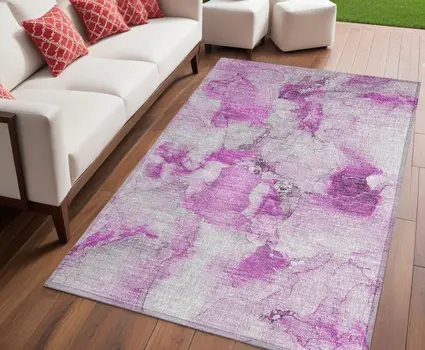 5' X 8' Pink and Ivory Abstract Washable Non Skid Indoor Outdoor Area Rug