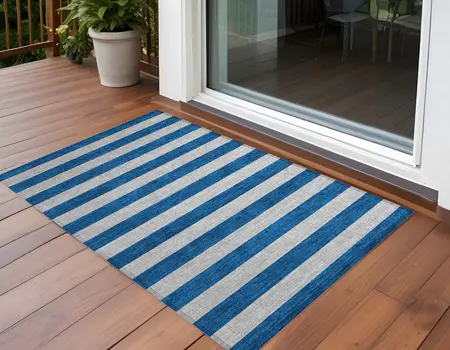 2' X 3' Blue and Ivory Striped Washable Non Skid Indoor Outdoor Area Rug