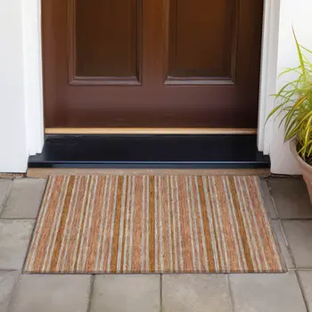 2' X 3' Beige and Orange Striped Washable Non Skid Indoor Outdoor Area Rug