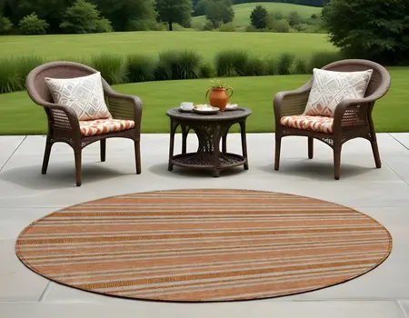 8' Round Beige and Orange Round Striped Washable Non Skid Indoor Outdoor Area Rug
