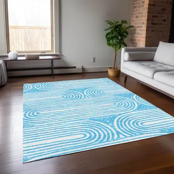 9' X 12' Teal and White Abstract Washable Non Skid Indoor Outdoor Area Rug