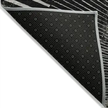 9' X 12' Black and Ivory Abstract Washable Non Skid Indoor Outdoor Area Rug