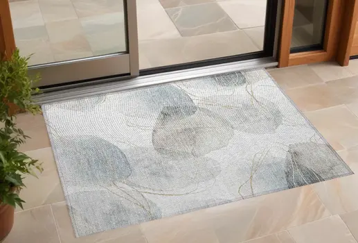 2' X 3' Ivory Blue and Gray Abstract Washable Non Skid Indoor Outdoor Area Rug