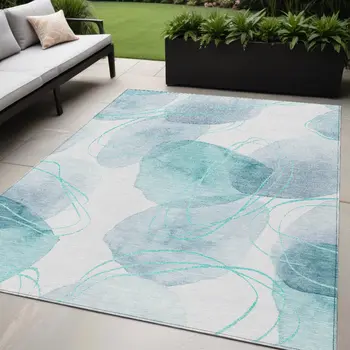 5' X 8' Teal and Ivory Abstract Washable Non Skid Indoor Outdoor Area Rug