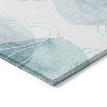 8' X 10' Teal and Ivory Abstract Washable Non Skid Indoor Outdoor Area Rug