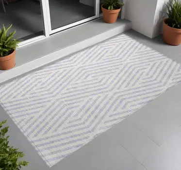 2' X 3' Lavender and Ivory Geometric Washable Non Skid Indoor Outdoor Area Rug
