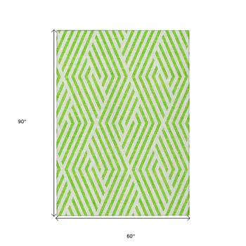 5' X 8' Lime Green and White Geometric Washable Non Skid Indoor Outdoor Area Rug