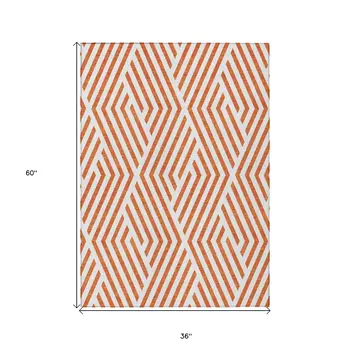 3' X 5' Orange And White Geometric Washable Indoor Outdoor Area Rug