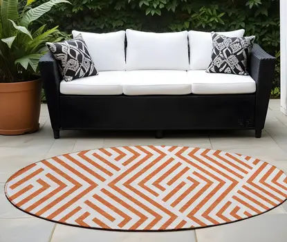 8' Round Orange and White Round Geometric Washable Non Skid Indoor Outdoor Area Rug
