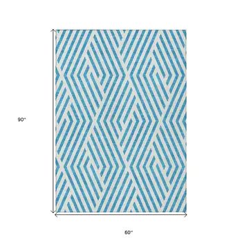 5' X 8' Teal and White Geometric Washable Non Skid Indoor Outdoor Area Rug