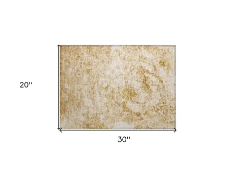 2' X 3' Cream and Gold Abstract Washable Non Skid Indoor Outdoor Area Rug