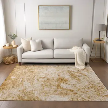 10' X 14' Cream and Gold Abstract Washable Non Skid Indoor Outdoor Area Rug