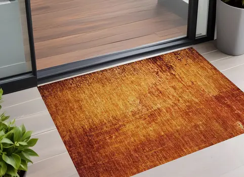 2' X 3' Orange Abstract Washable Non Skid Indoor Outdoor Area Rug