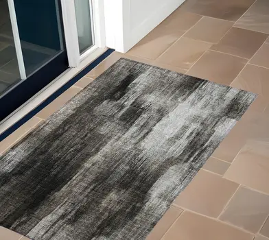 2' X 3' Gray and Black Abstract Washable Non Skid Indoor Outdoor Area Rug