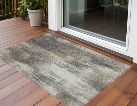 2' X 3' Taupe and Gray Abstract Washable Non Skid Indoor Outdoor Area Rug