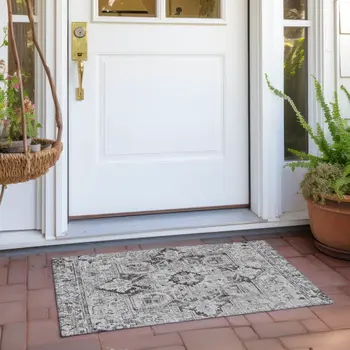 2' X 3' Ivory and Dark Brown Oriental Washable Non Skid Indoor Outdoor Area Rug
