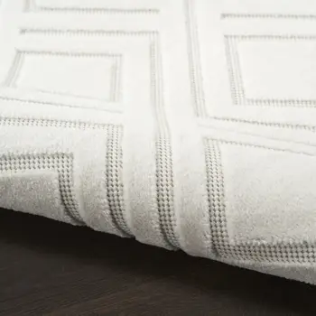 5' X 7' Cream Geometric Area Rug