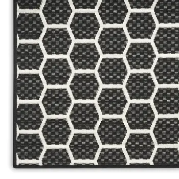 8' Black And Ivory Geometric Indoor Outdoor Runner Rug