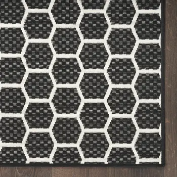 10' Black And Ivory Geometric Indoor Outdoor Runner Rug