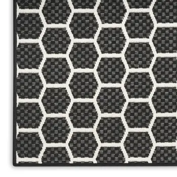 10' Black And Ivory Geometric Indoor Outdoor Runner Rug
