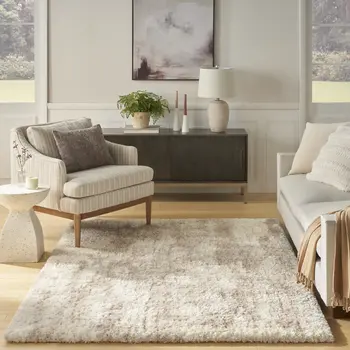 4' X 6' Beige and Ivory Abstract Shag Area Rug