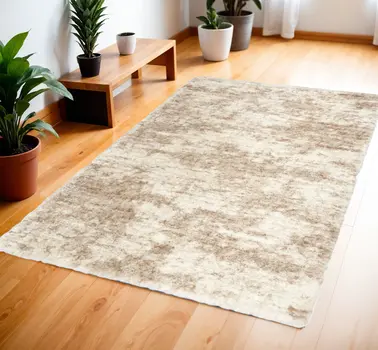 4' X 6' Beige and Ivory Abstract Shag Area Rug
