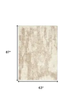 5' X 7' Beige and Ivory Abstract Shag Area Rug