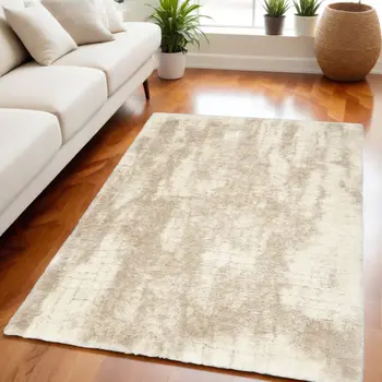 5' X 7' Beige and Ivory Abstract Shag Area Rug
