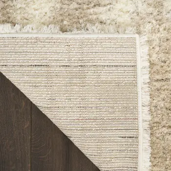 5' X 7' Beige and Ivory Abstract Shag Area Rug