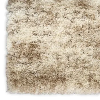 5' X 7' Beige and Ivory Abstract Shag Area Rug