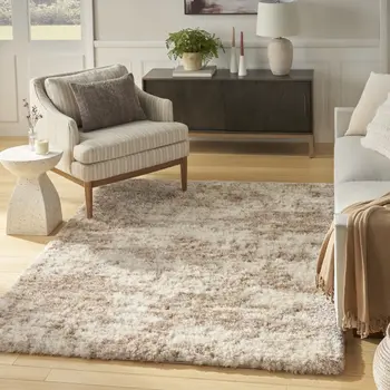 5' X 7' Beige and Ivory Abstract Shag Area Rug