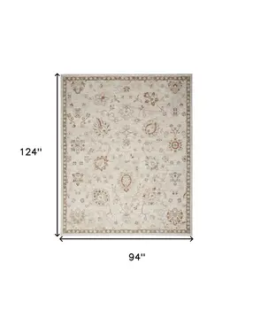 8' X 10' Cream Floral Power Loom Distressed Area Rug With Fringe