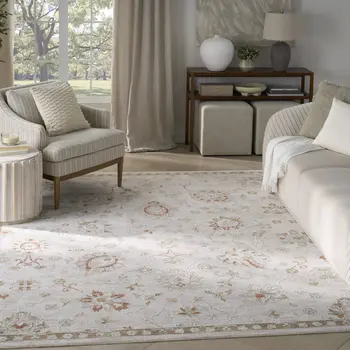 8' X 10' Cream Floral Power Loom Distressed Area Rug With Fringe