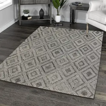 5' X 8' Black and Ivory Wool Abstract Geometric Hand Tufted Non Skid Area Rug