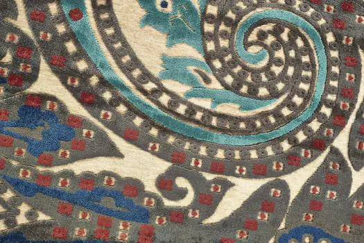 8' X 11' Tan Blue and Taupe Paisley Power Loom Area Rug