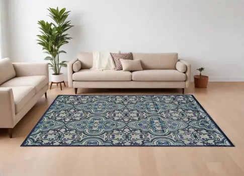 8' X 11' Tan Blue and Taupe Damask Power Loom Area Rug