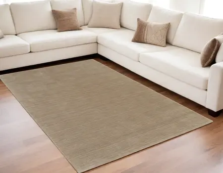 5' X 8' Tan Wool Hand Woven Area Rug