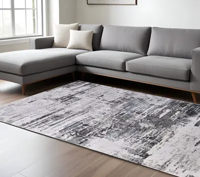 8' X 11' Gray Ivory and Taupe Abstract Power Loom Worn Faded Area Rug