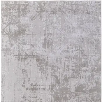 5' X 8' Taupe and Ivory Abstract Power Loom Worn Faded Area Rug
