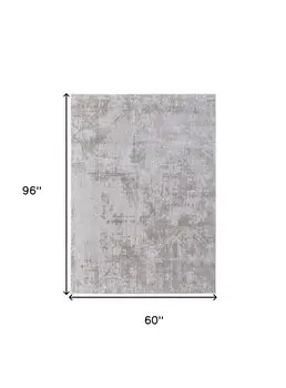 5' X 8' Taupe and Ivory Abstract Power Loom Worn Faded Area Rug