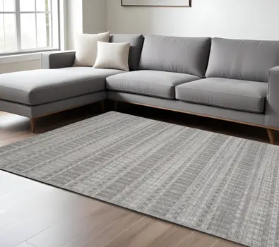 7' X 9' Gray and Ivory Geometric Hand Woven Area Rug