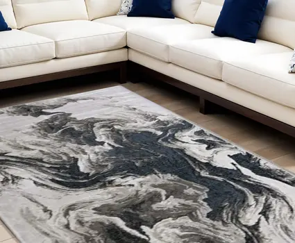 7' X 10' Ivory Black and Taupe Abstract Power Loom Area Rug