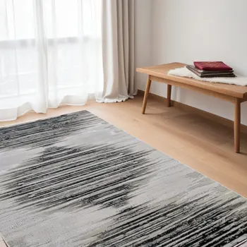 5' X 8' Black and Silver Geometric Power Loom Area Rug