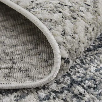 5' X 8' Gray and Ivory Abstract Power Loom Area Rug